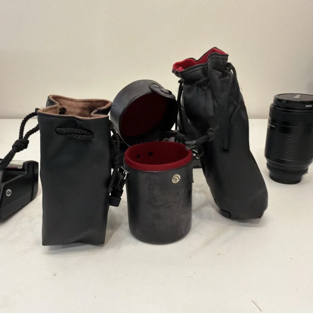 NIKON N6006 FILM SLR CAMERA. W/ ASSORTED LENSES AND ACCESSORIES. UNTESTED.